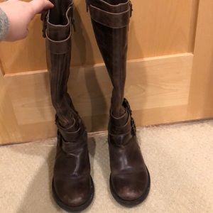 Brown boots with buckle details!